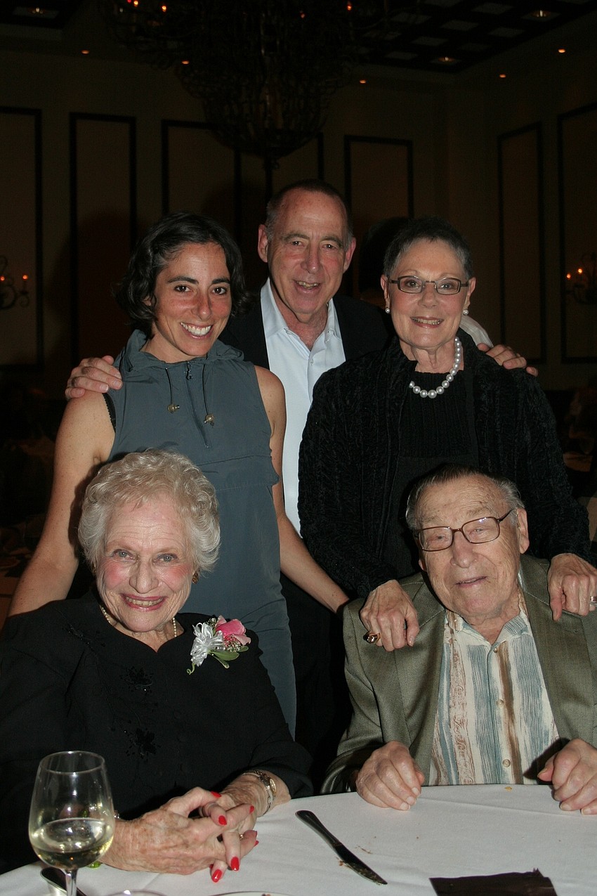 Three generations of Smalls -- Sabrina, Harvey, Jeanie and patriarch Philip and Philip's friend Joyce Peck