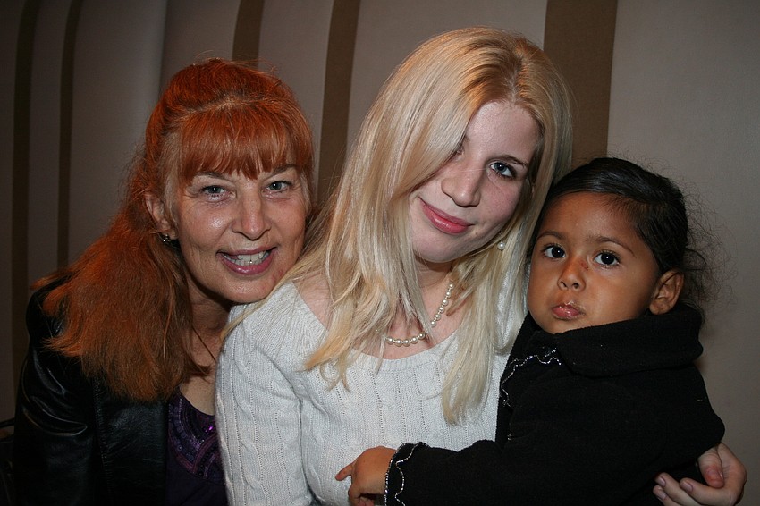Nancy and Megan Stollar with Aaliyah St. John-Garcia