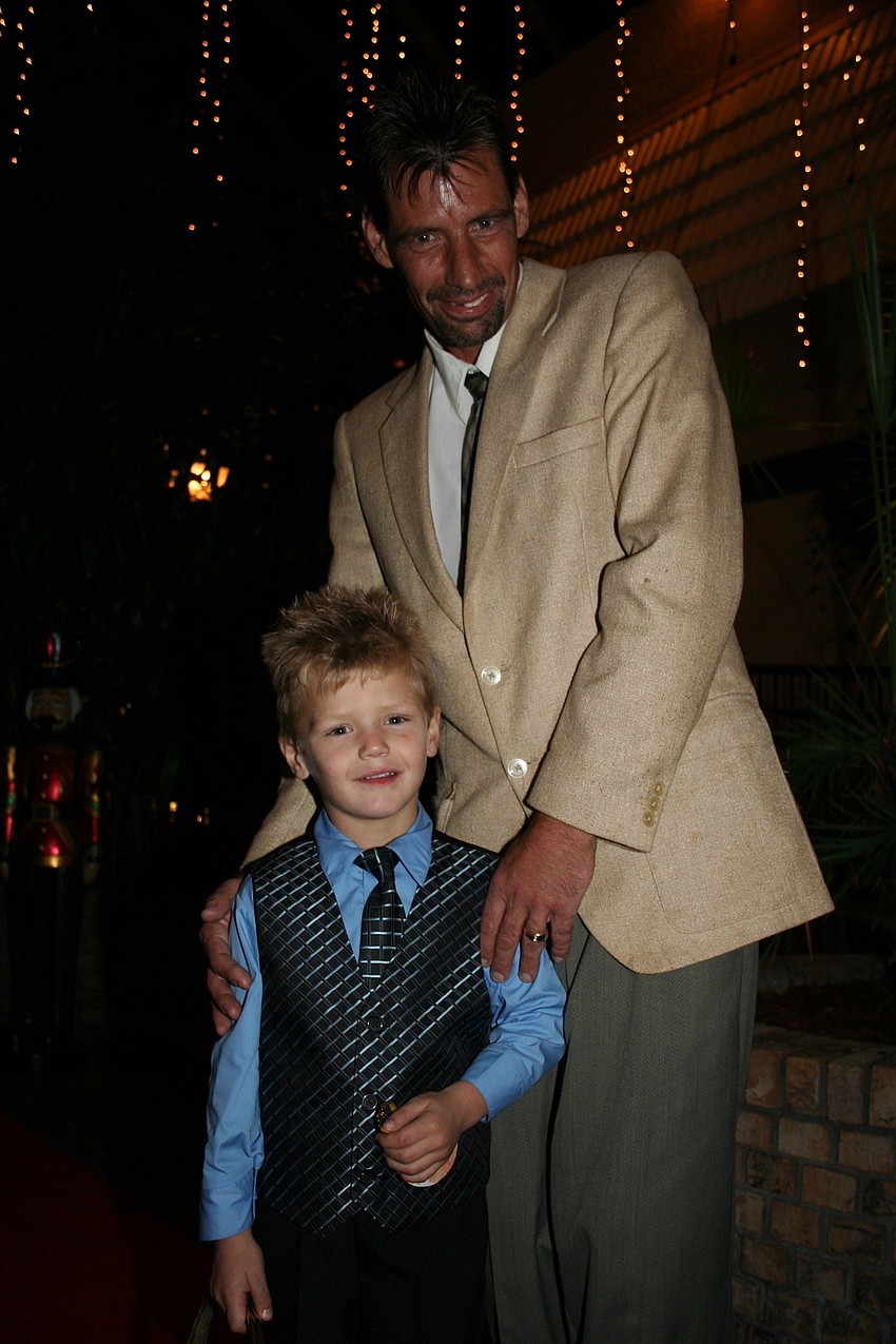 Kevin and Troy Wendorff passed out ornaments to guests