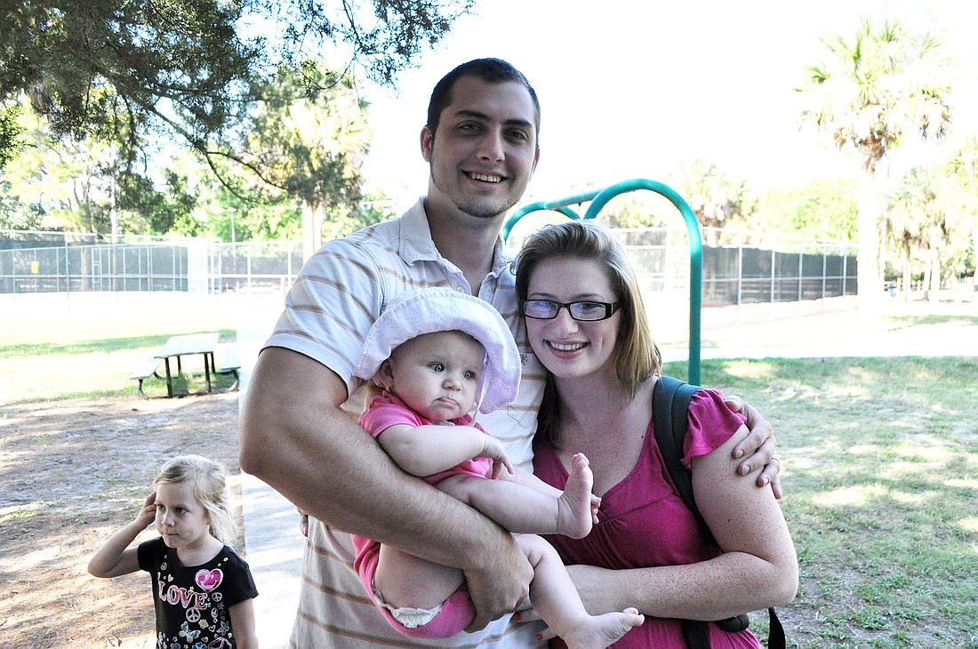 Mike and Lauren Grow with their baby girl, Brooklynn.