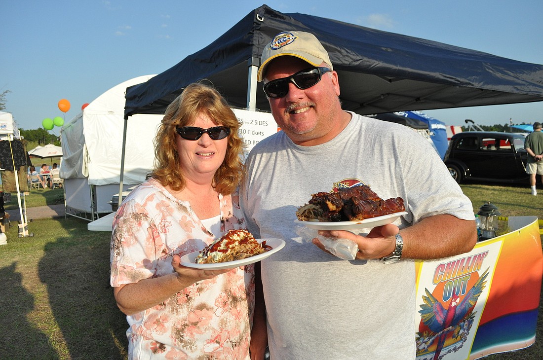 Zena and Tommy Powell show off their barbecue plates from Chillin Out, the winners of the best fallinÃ¢â‚¬â„¢-off-the-bone tender award.
