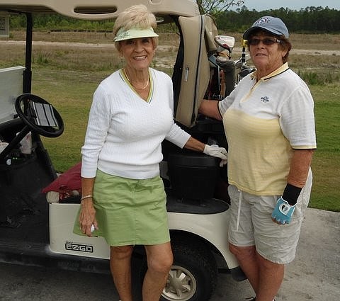 Diana Mariano, left, and Linda Block, right, stop during their Friday Ladies game at Grand Reserve. Photo courtesy of Jock MacKenzie