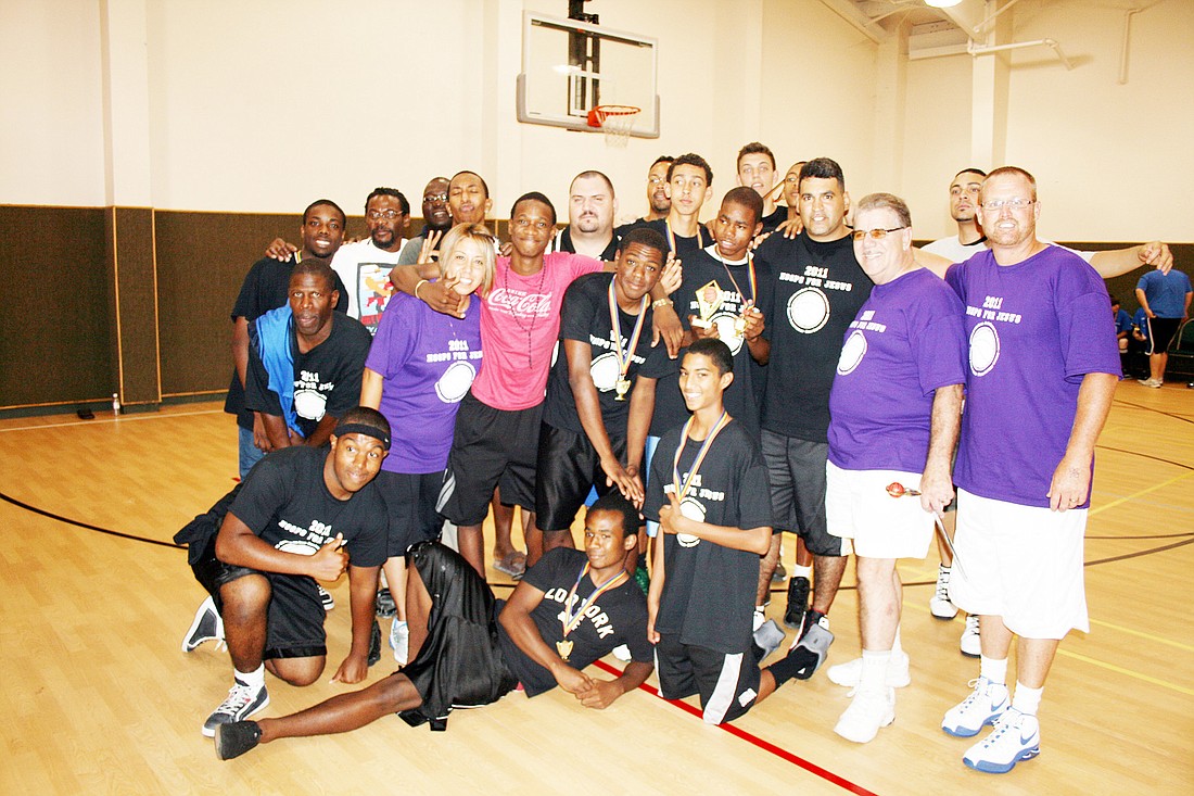 Team GodÃ¢â‚¬â„¢s Family Bible Church took first place in the Hoops for Jesus Basketball Tournament. COURTESY PHOTOS