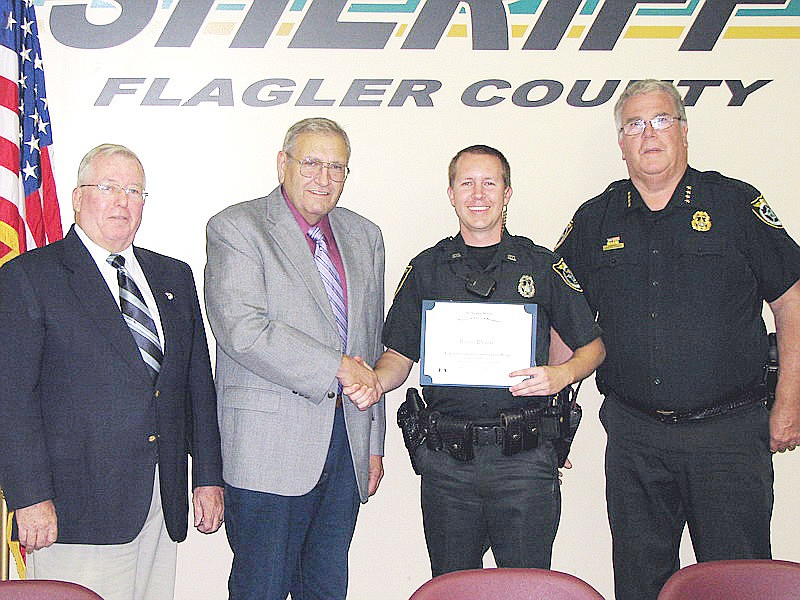 SAR member Bill Creager, President Ted St. Pierre, Deputy Daniel Weaver and Sheriff Don Fleming. COURTESY PHOTO