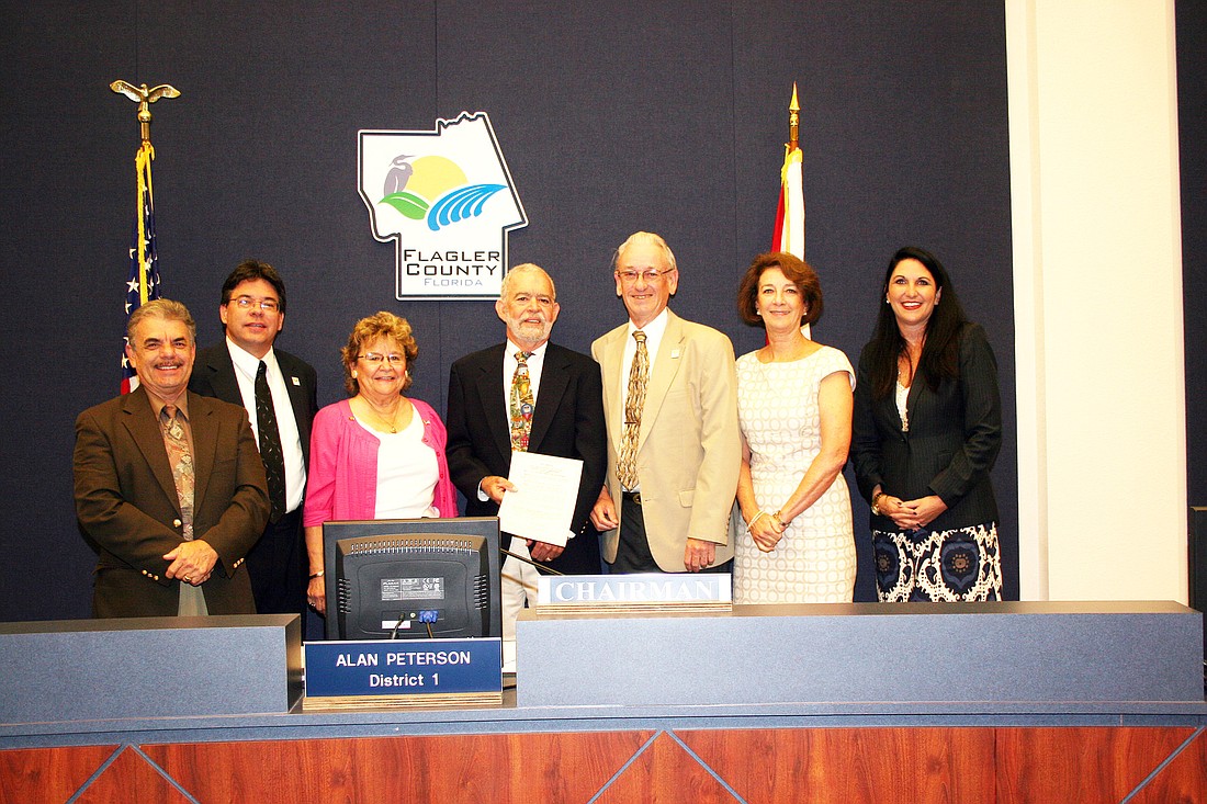 Commissioners George Hanns and Nate McLaughlin, NARFE Treasurer Aimi Brown, NARFE First Vice President Lary Cook and Commissioners Alan Peterson and Milissa Holland. COURTESY PHOTO