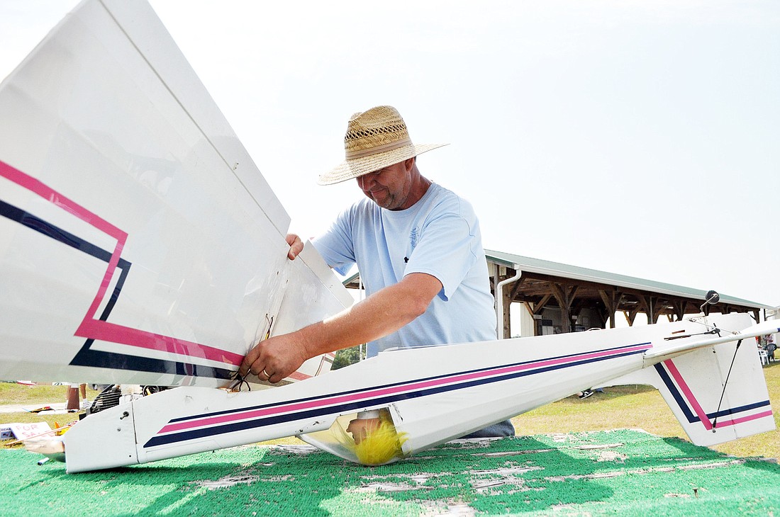 Dennis Seiferheld takes apart his planes after finishing flying for the day. PHOTOS BY SHANNA FORTIER