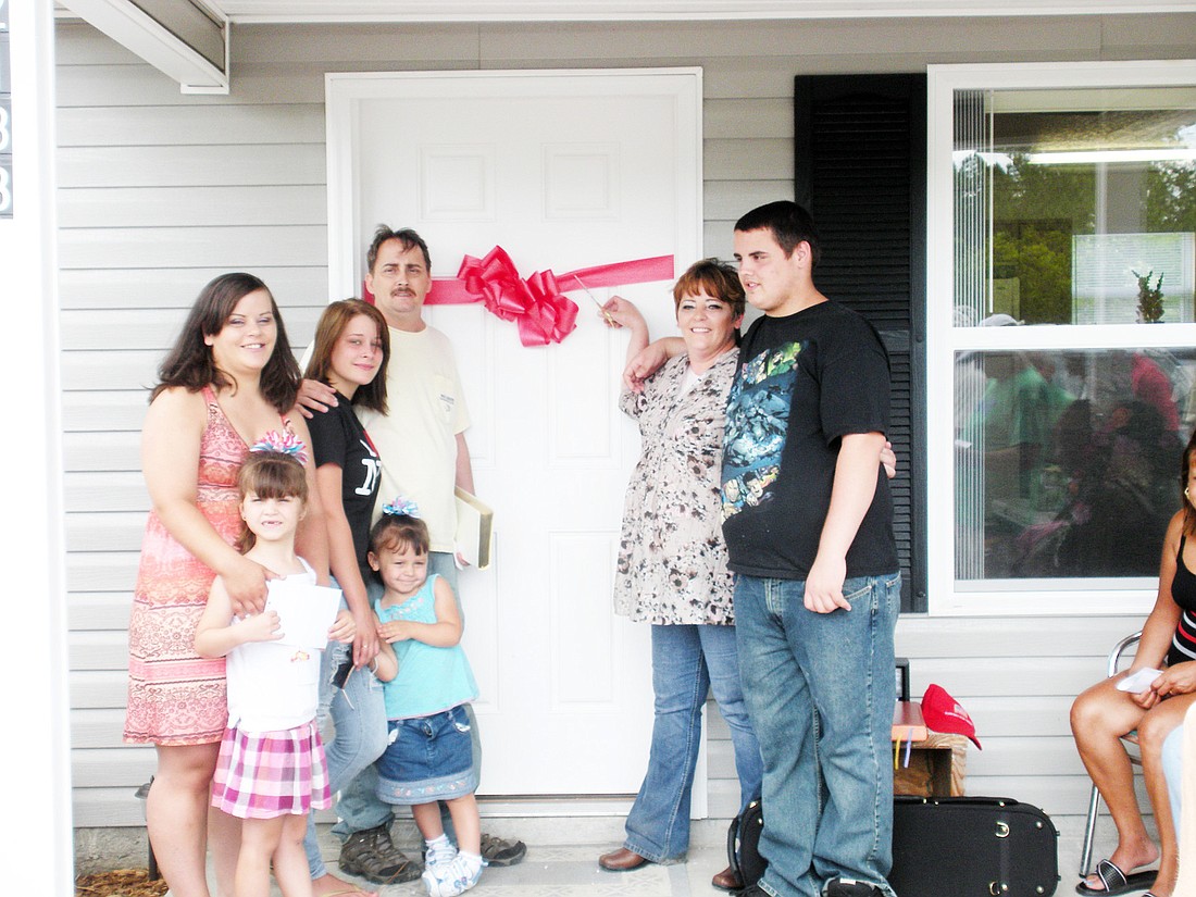The Kemper family at their house dedication. COURTESY PHOTO