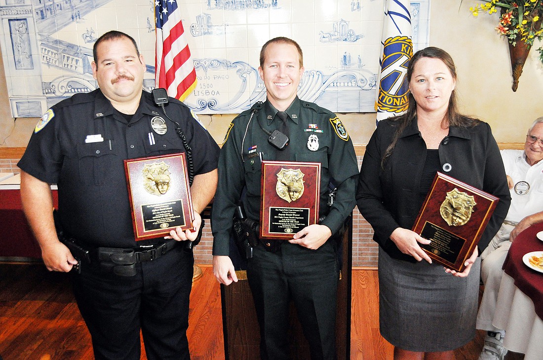 Officer David Blank, Flagler Beach Police Department; Deputy Daniel Weaver, Flagler County SheriffÃ¢â‚¬â„¢s Office; and Mary Giannotto, assistant to the chief, Bunnell Police Department.