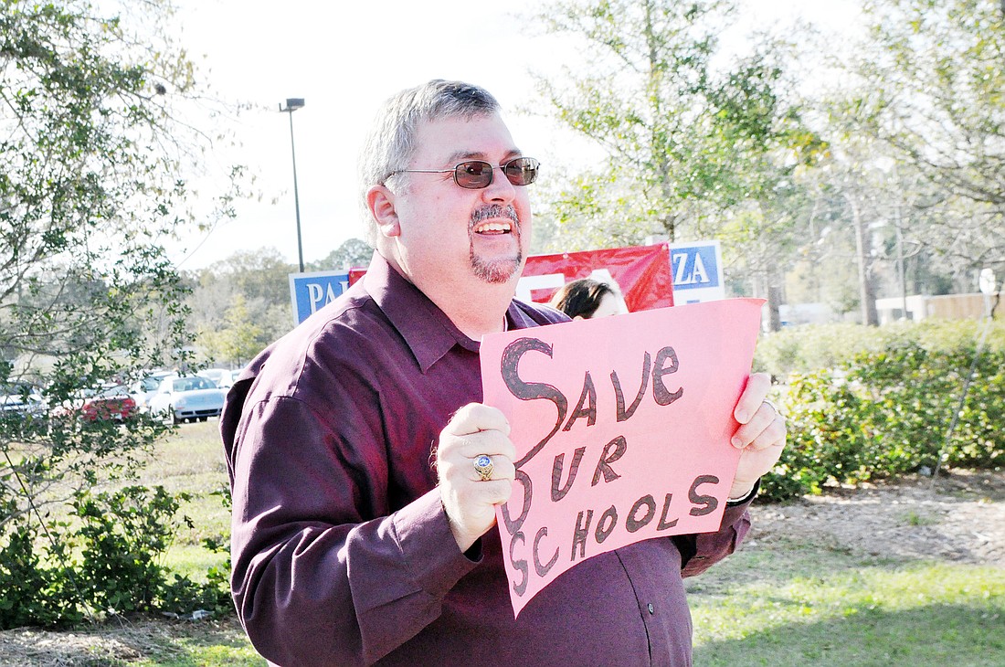 Matanzas High School Principal Chris Pryor, shown here at a March rally, has been an advocate for teachers and administrators alike. FILE PHOTO BY SHANNA FORTIER