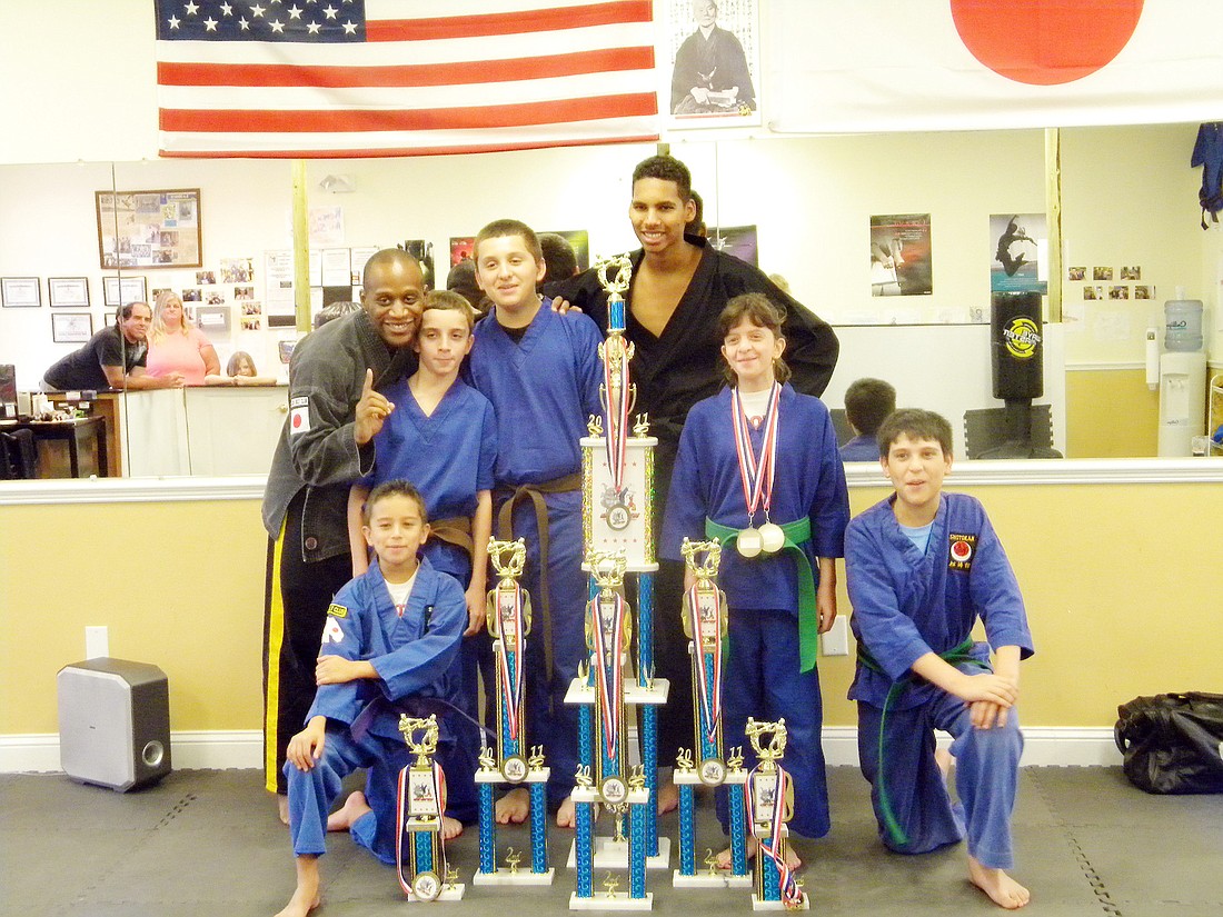 Back row, from left: Instructor Kevin Williams, Anthony Schettino, Paul Schettino, Johnny Pingshaw, Cindy Matrosoff; front: Mathias Daza and Thomas Rocco Jr. (not pictured: Andrew Mays). COURTESY PHOTO
