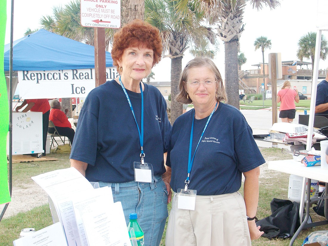 Volunteers Eleanore Goepel and Alison Rimer; the average volunteer is a 67-year-old female who logs 12 volunteer hours per month. COURTESY PHOTO