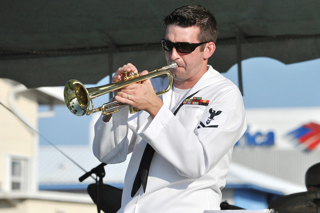 Robert Taylor, of the U.S. Navy Jazz Band, brought down the house at the June First Friday Music in the Park.