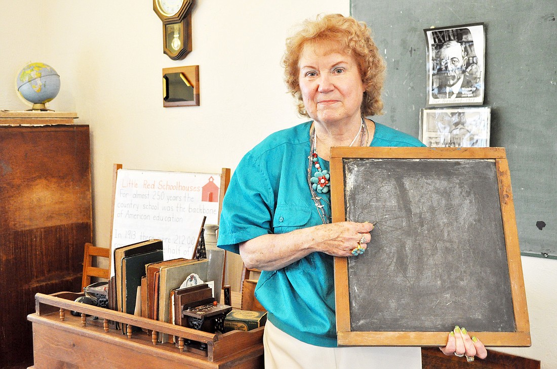 Diane Marquis was instrumental in the project. The Little Red School House Museum was dedicated to her.