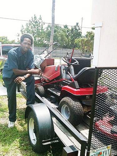 Christopher Haynes, 27, has started a new business called Beach Boys Lawn Care, one of about 250 home-based businesses opened in the past 12 months, in Palm Coast. COURTESY PHOTO