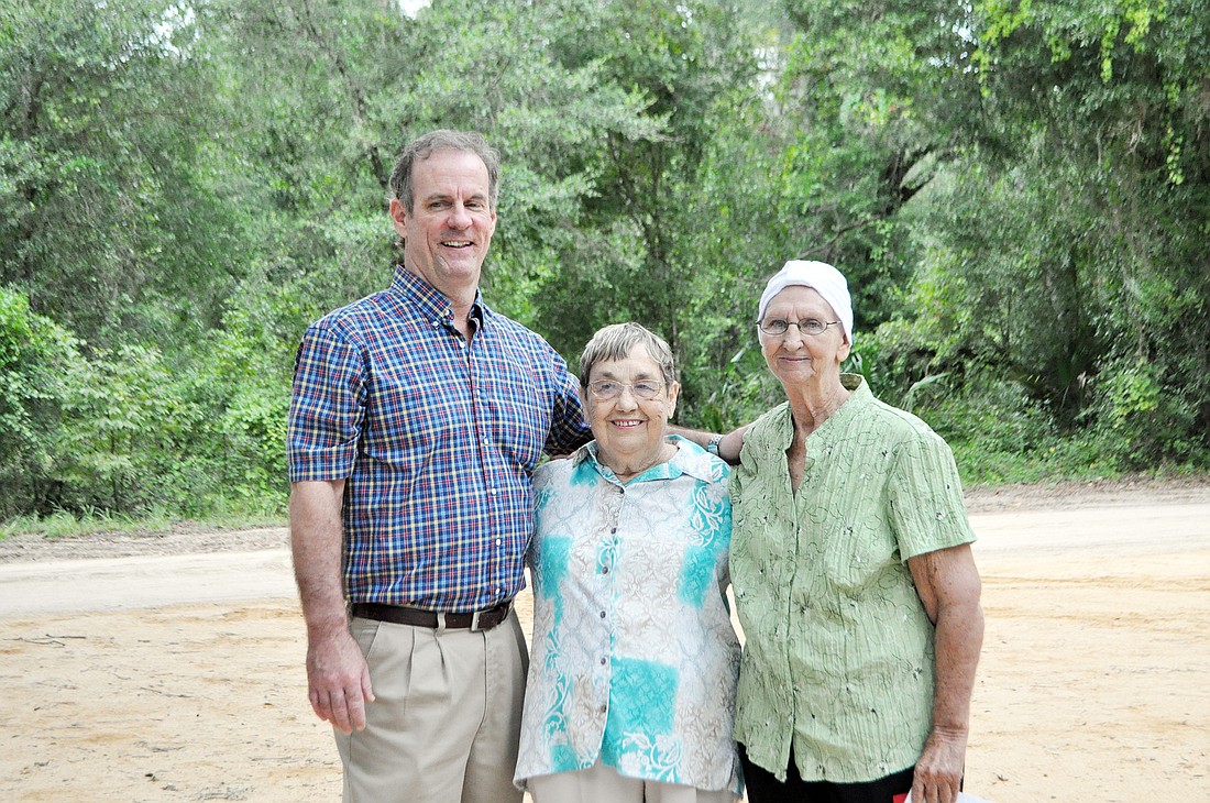 Reed Atkinson, great-grandson of George Moody; Patsy Durrance, granddaughter of Isaac I. Moody; and Marie Moody Logan, granddaughter of Robert Moody