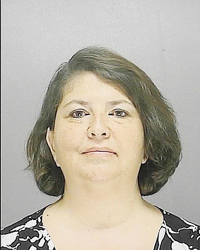 Diana Kindt, former executive director of the Family Life Center, is charged with organizing a scheme to defraud.
