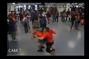 The fight in the video led to a student head-butting and throwing punches at Don Apperson, a school resource deputy.