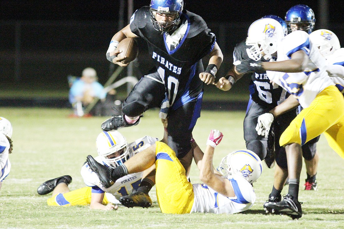 Matanzas running back Shawn White scored three times in the PiratesÃ¢â‚¬â„¢ homecoming win Friday, Oct. 14, against Fernandina Beach. PHOTOS BY SHANNA FORTIER