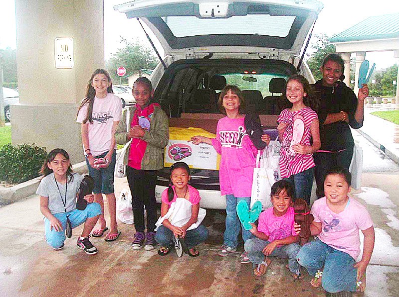 Girls in Action collected 160 pairs of flip-flops. COURTESY PHOTO
