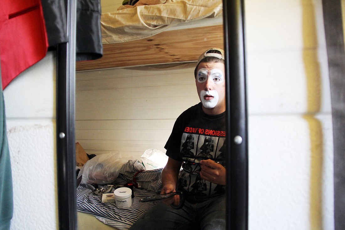 Josh Ã¢â‚¬Å“MeatballÃ¢â‚¬Â Dummitt, from Connecticut, puts on his clown makeup in his room before the show. Dummitt has been a clown with Cole Bros. since July, 1.