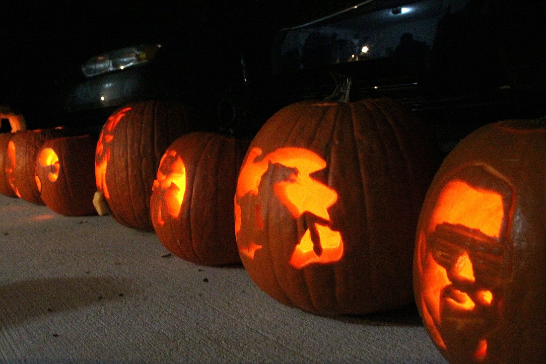 The night before, we carved pumpkins: Linus (Emily), the headless horseman (Shanna), Kanye West (me).