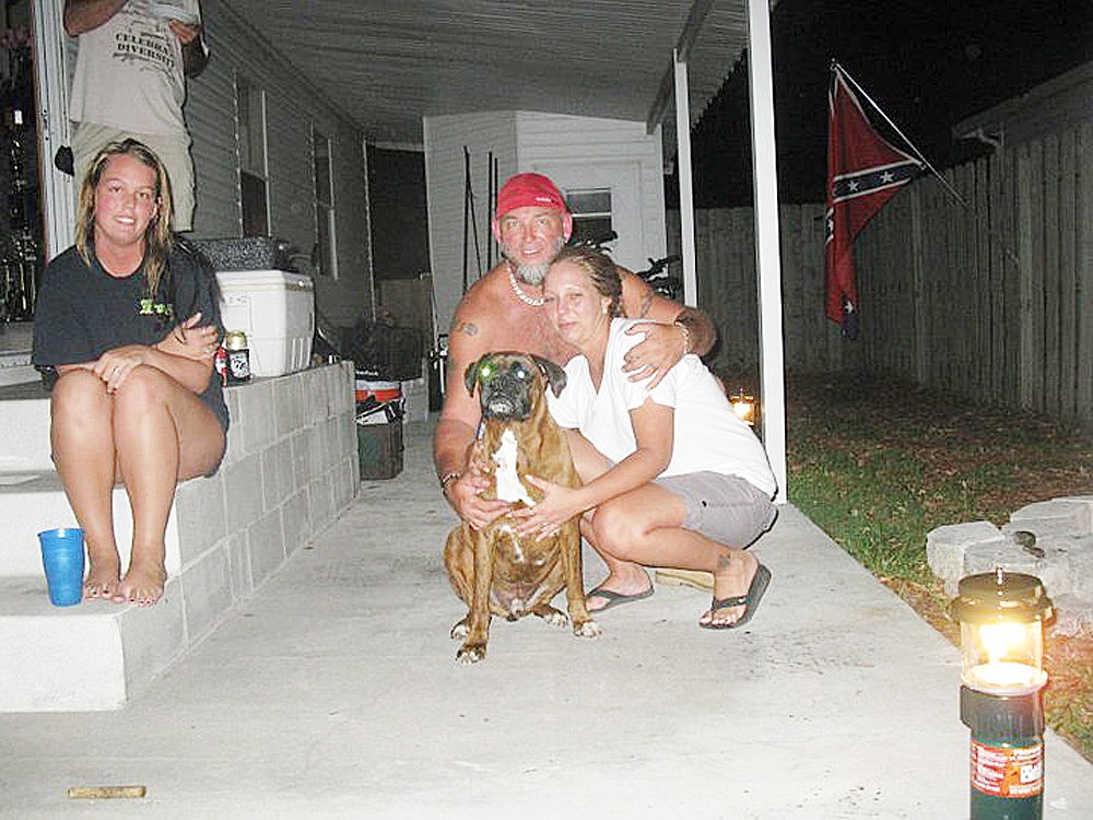 Jerry Lee and Bev McMichael and their Second Chance Rescue adoptee Claybo. COURTESY PHOTO