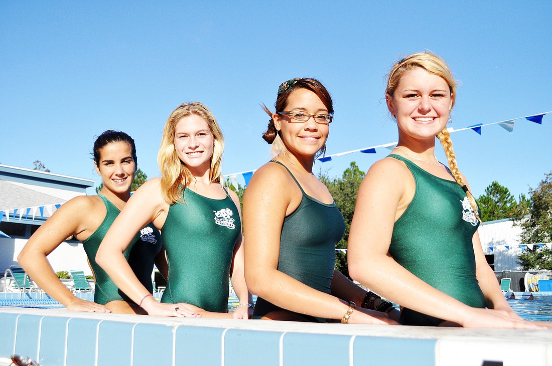 From left: Carolyne Vasconcellos, Margaret Cruz, Nomari Marrero and Julie Concannon. The four finished ninth in the region in the 400-yard freestyle relay.