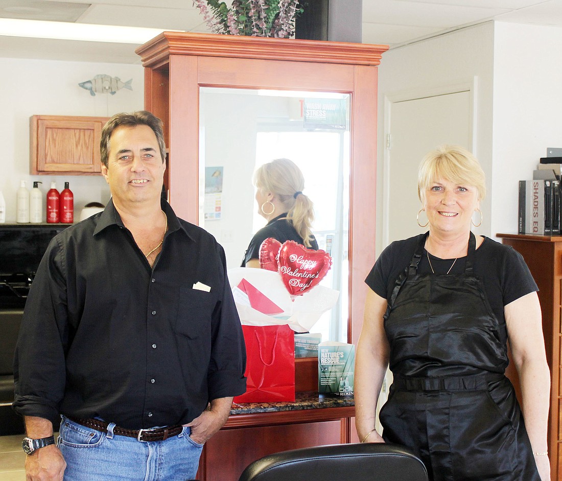 Cuts & Curls owners Brian and Cindy Carroll. COURTESY PHOTO