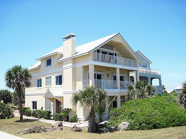 This bank-owned Oceanshore Boulevard home sold for $510,000. COURTESY PHOTO