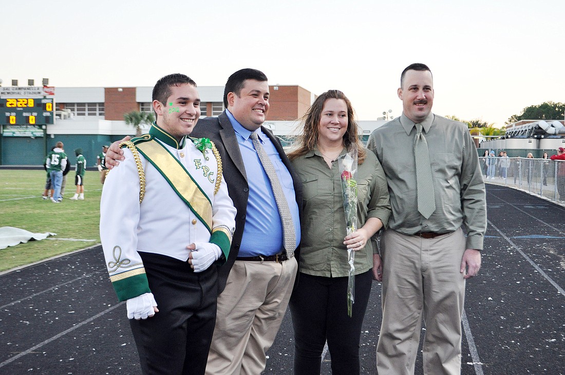 Senior band member Frankie Garcia, FPC band director John Seth, and Rebecca and Shane Wood. PHOTOS BY SHANNA FORTIER