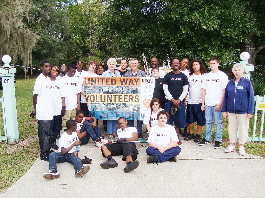 Woody Douge and a group of 28 volunteers cleaned up the Department of Juvenile Justice Community Garden. COURTESY PHOTO
