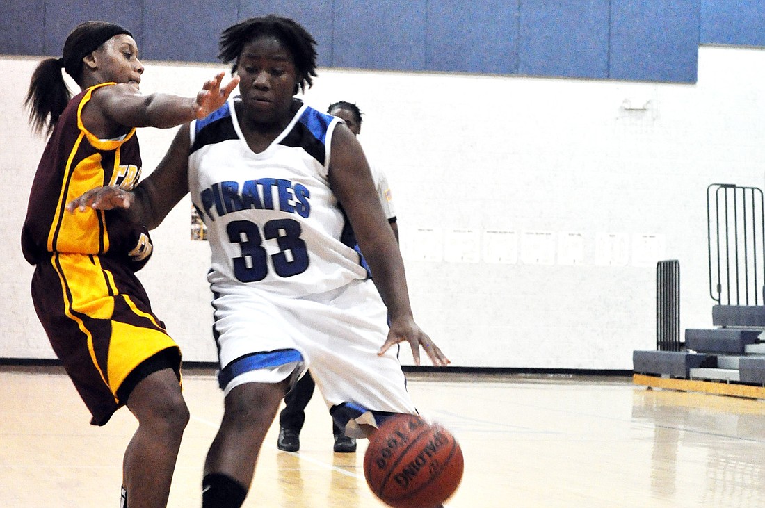 Junior guard Margaret Calhoun drives to the hoop Tuesday, Nov. 15, against Crescent City in the Matanzas Lady PiratesÃ¢â‚¬â„¢ home opener. PHOTO BY ANDREW O'BRIEN