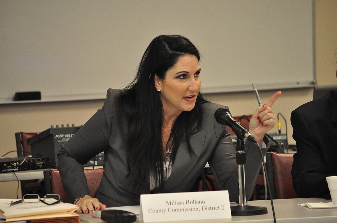 County Commissioner Milissa Holland hopes recent legislation will lead to online travel companies paying Ã¢â‚¬Å“their fair shareÃ¢â‚¬Â of sales taxes.