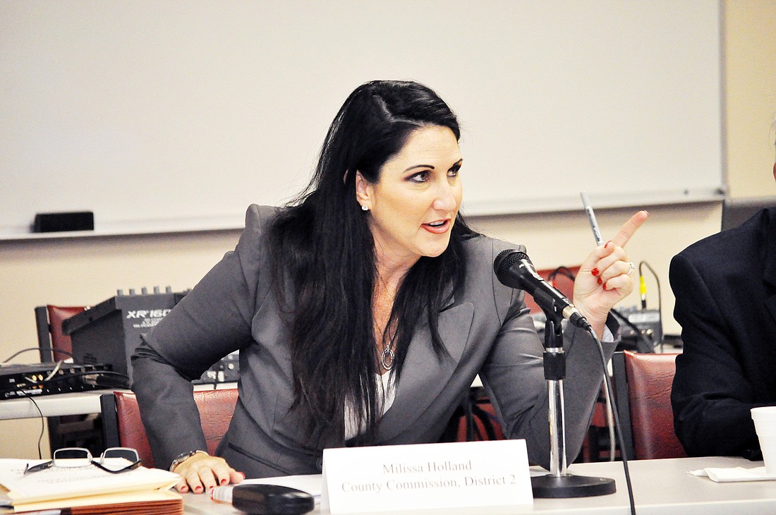 Commissioner Milissa Holland believes that a federal lobbyist could help secure funding for her Farm to Flag initiative.