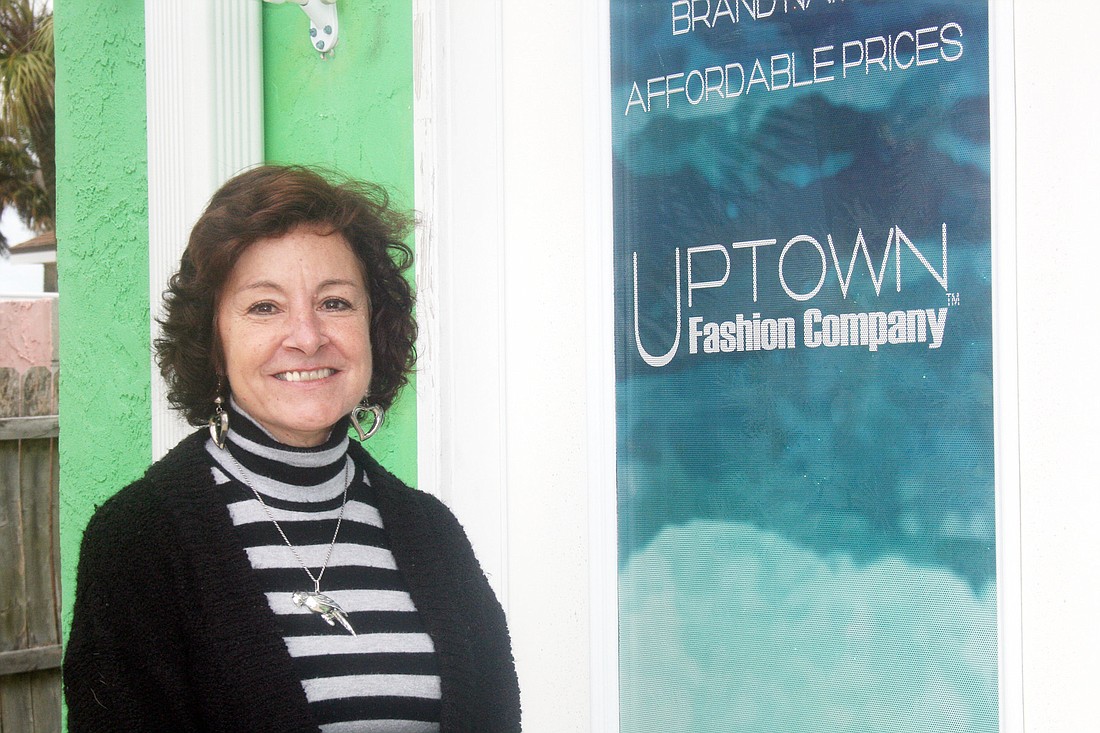 Dona Bross, owner of Uptown Fashion Co., formerly worked as an interior designer. PHOTO BY MIKE CAVALIERE