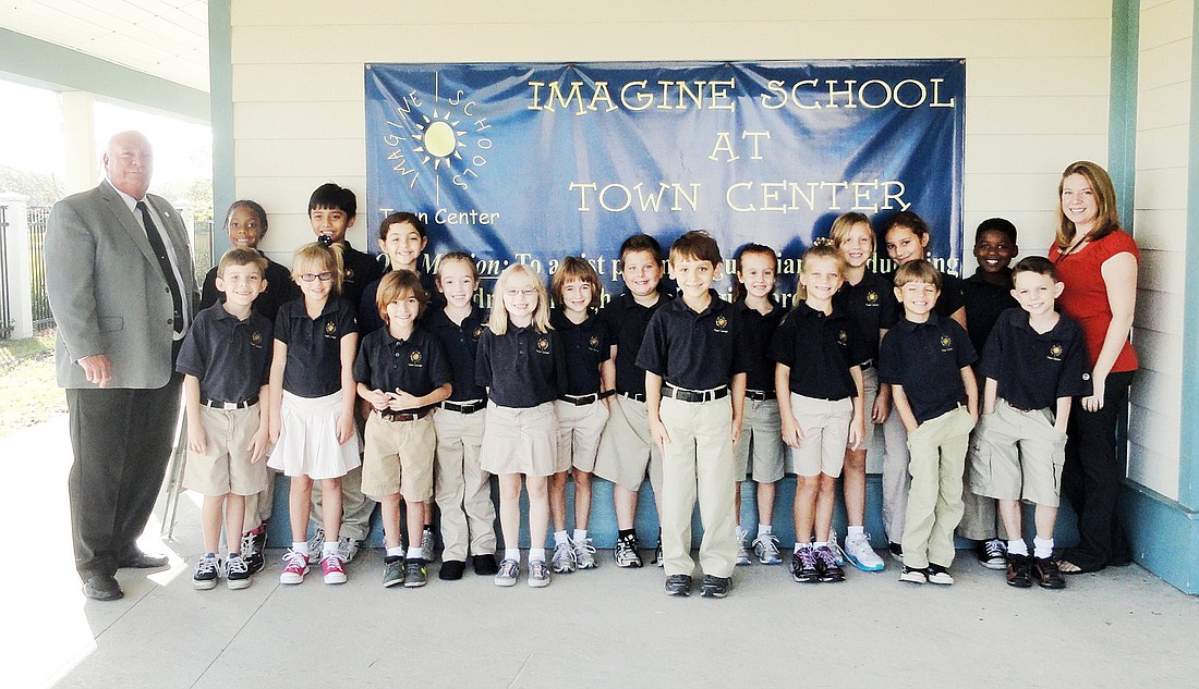 Mayor Jon Netts visited students at Imagine School at Town Center. COURTESY PHOTOS