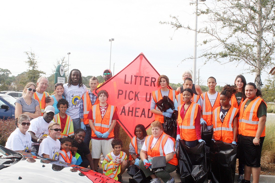 A group of volunteers cleaned a section of State Road 100 that was adopted by the Gilyard Group Foundation. COURTESY PHOTO