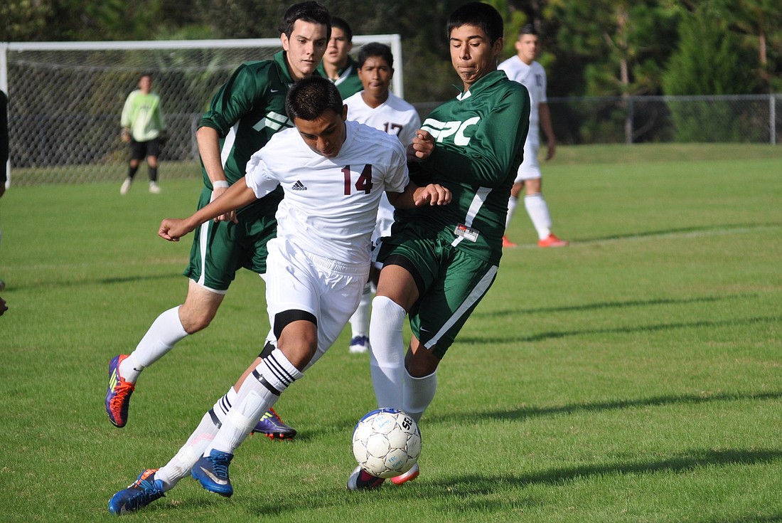 Johnny Osorio (right) scored three goals in the Friday night game against New Smyrna Beach. FILE PHOTO