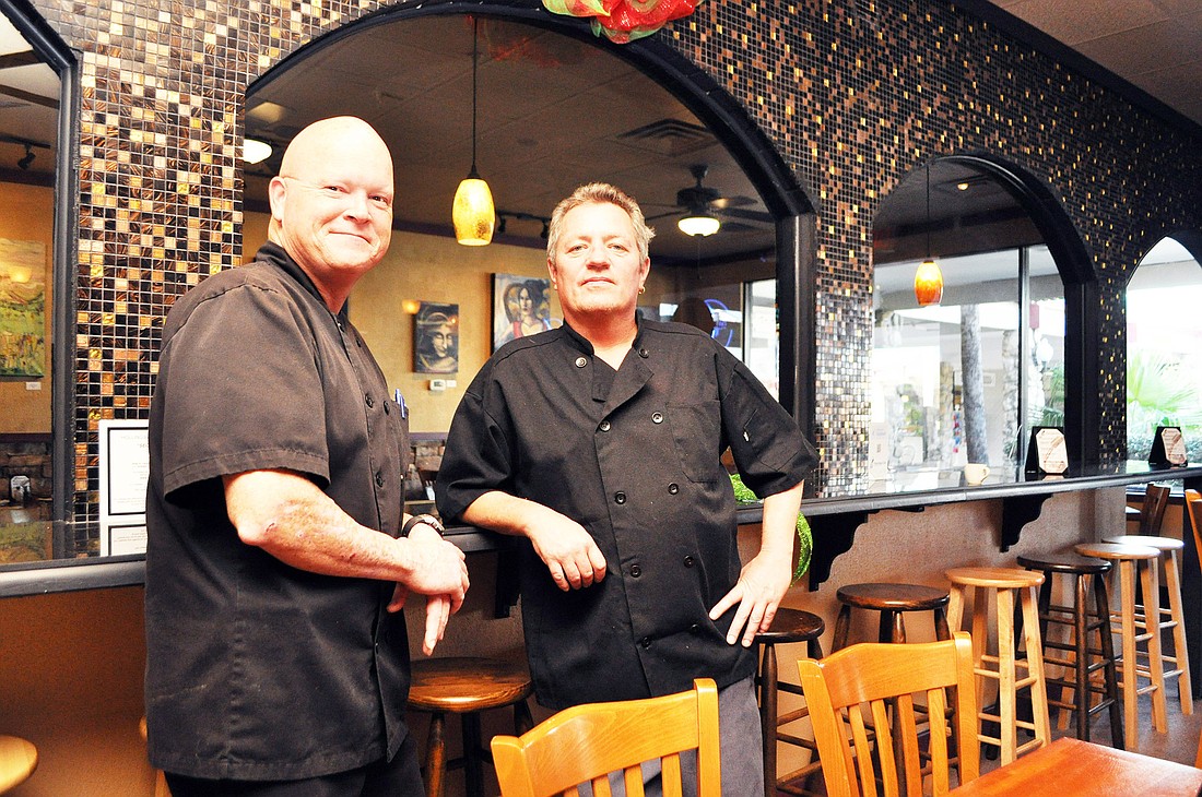 Barry Markey and Bob Plugge opened Three Dogs Grill in late October.