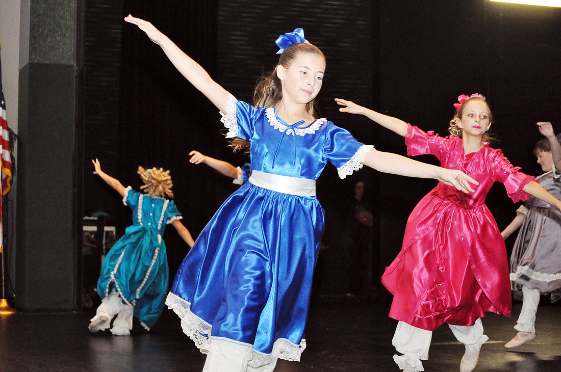 Gabriella Barton dances the part of a party girl during Ã¢â‚¬Å“The Nutcracker.Ã¢â‚¬Â PHOTOS BY SHANNA FORTIER