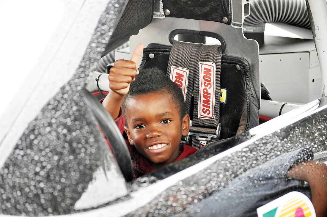 Markiece Morgan was the third-grader who got to sit in the race car.