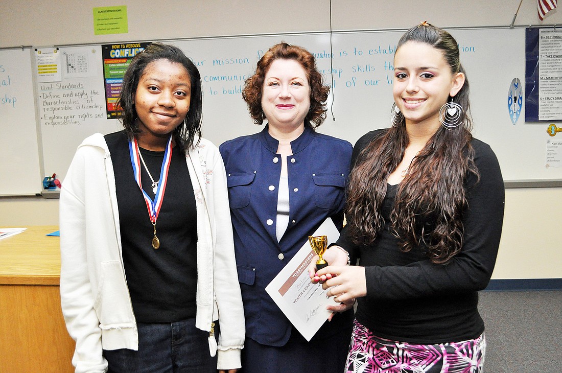 First place winner Bertina Guerrier, teacher Vicki Dawson, and runner-up Jaylene Leto. PHOTOS BY SHANNA FORTIER