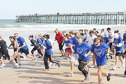 About 200 participants attended the race at low tide. COURTESY PHOTOS