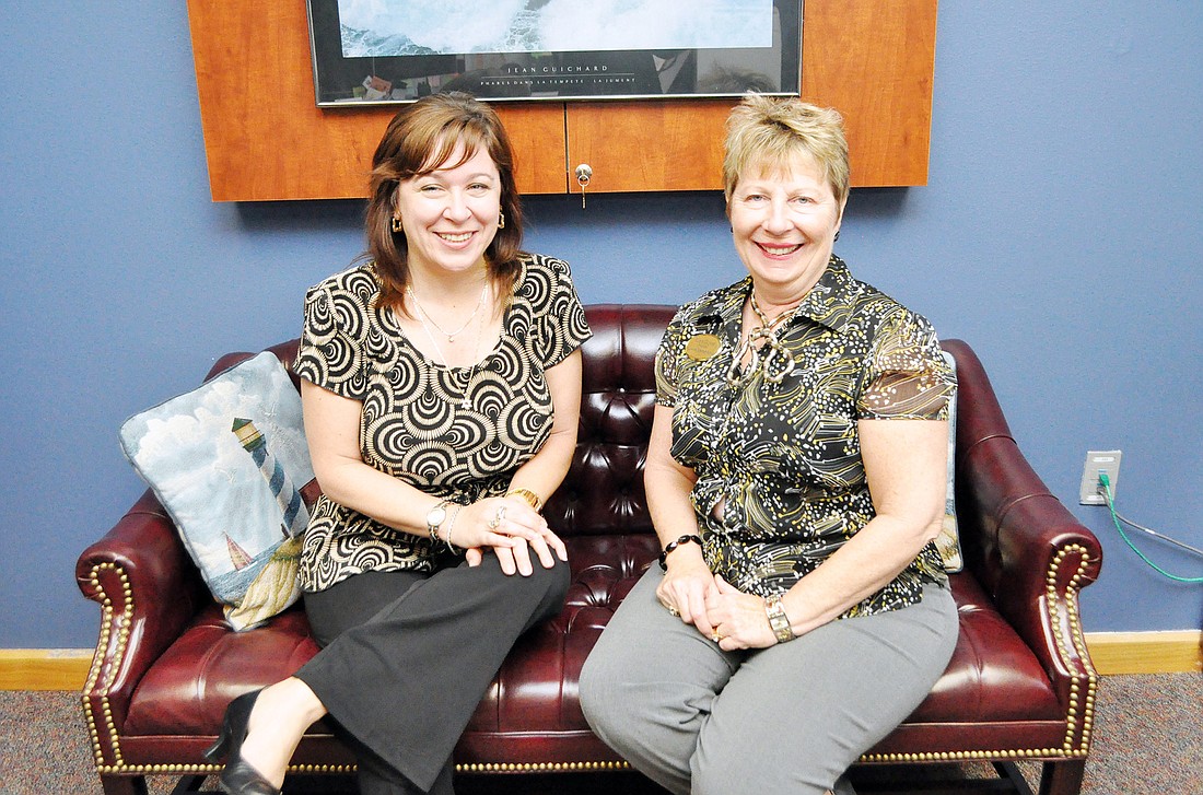 Intracoastal Bank Senior Vice President Cheryl Tanenbaum and Wadsworth Elementary School Principal Robin Dupont