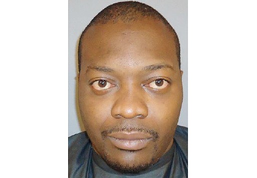 Cary Hudson Jr.'s arms were covered in blood after he allegedly beat a 51-year-old Palm Coast woman Tuesday night.