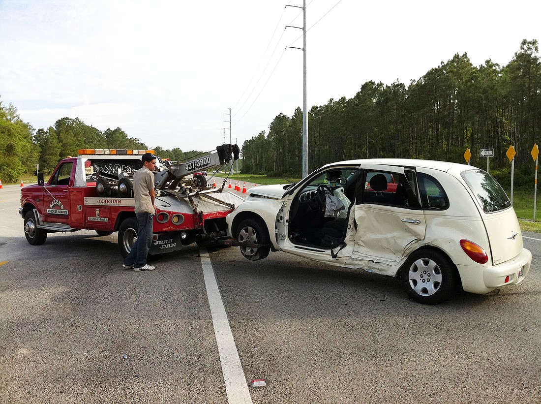 This PT Cruiser crashed Thursday, April 14, at Whiteview Lane and U.S. 1. PHOTO BY BRIAN MCMILLAN