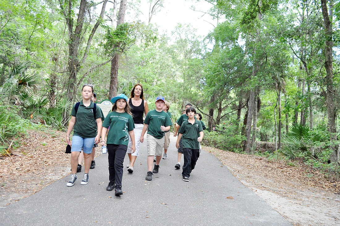 Students from Phoenix Academy visited Linear Park for an eco tour given by FPC Serve and Learn students. PHOTOS BY SHANNA FORTIER