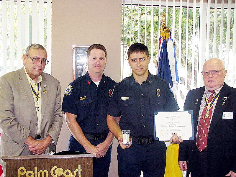 President Son of the American Revolution Flagler Chapter Ted St. Pierre, EMS Chief Sean Majors,Ã‚Â Nikolay KulevÃ‚Â and Chairman of Awards David Kelsey. COURTESY PHOTO