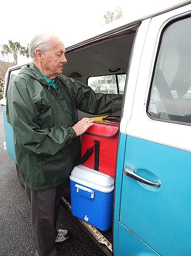 Tom Ross packs his van to deliver on his Meals on Wheels route.  Ross and his wife Jean drove for Meals on Wheels for nearly 30 years before "retiring." Courtesy photo COA