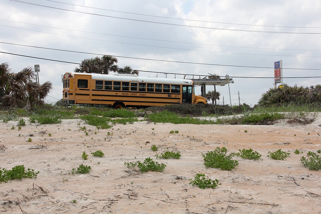 A Volusia County school bus travels up A1A with a much better view of the ocean. Photo by Jacque Estes